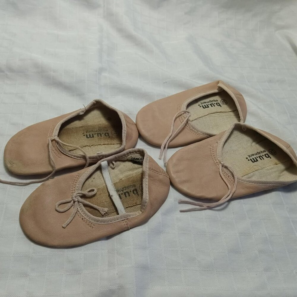 Three pairs of dance slippers: one in leather (1977) two in fabric (2005)